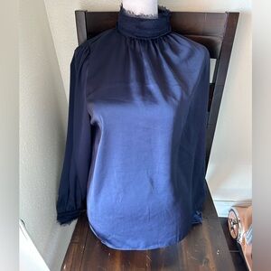 Navy blue silk blouse with a high neck